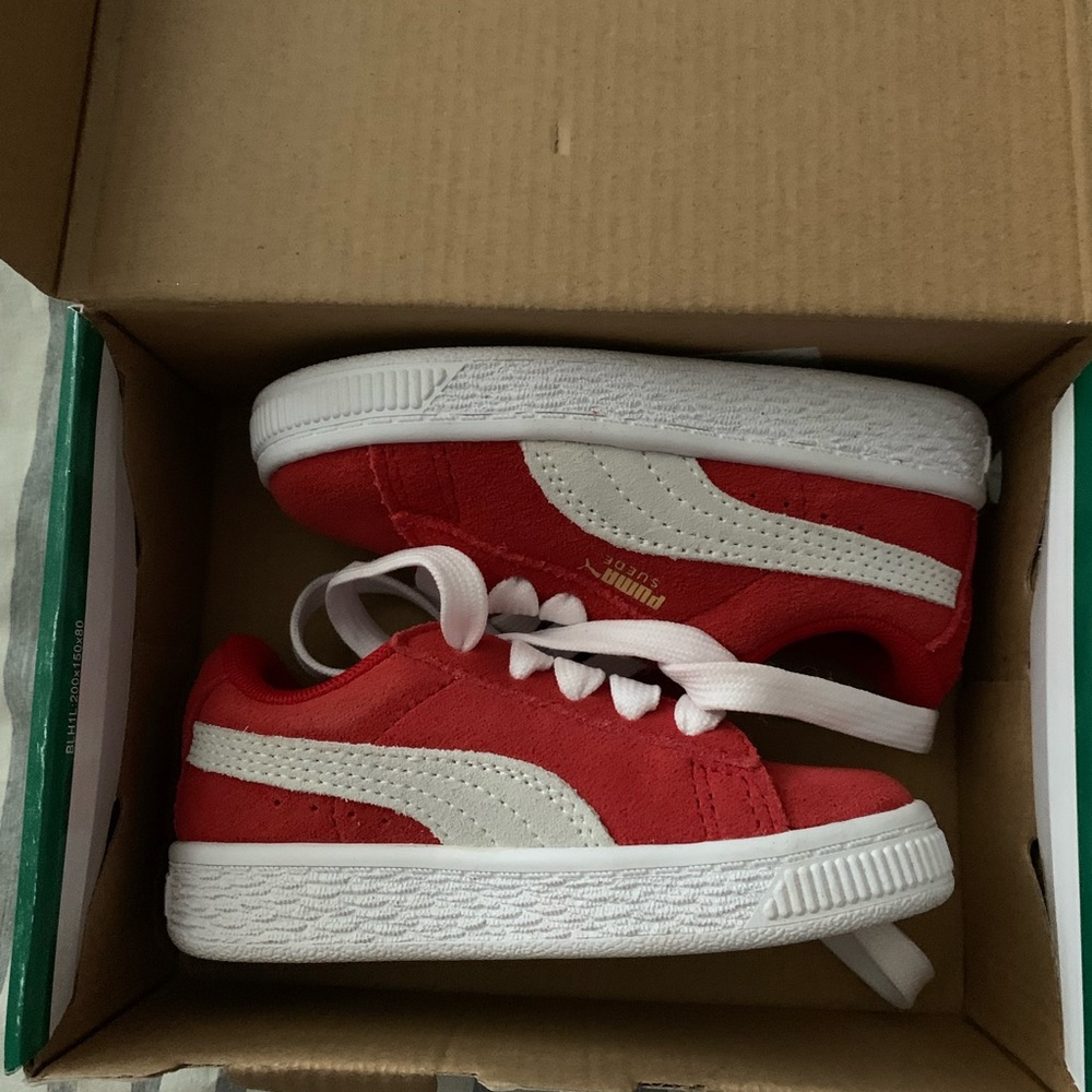 Pumas red and white baby/toddler shoes.